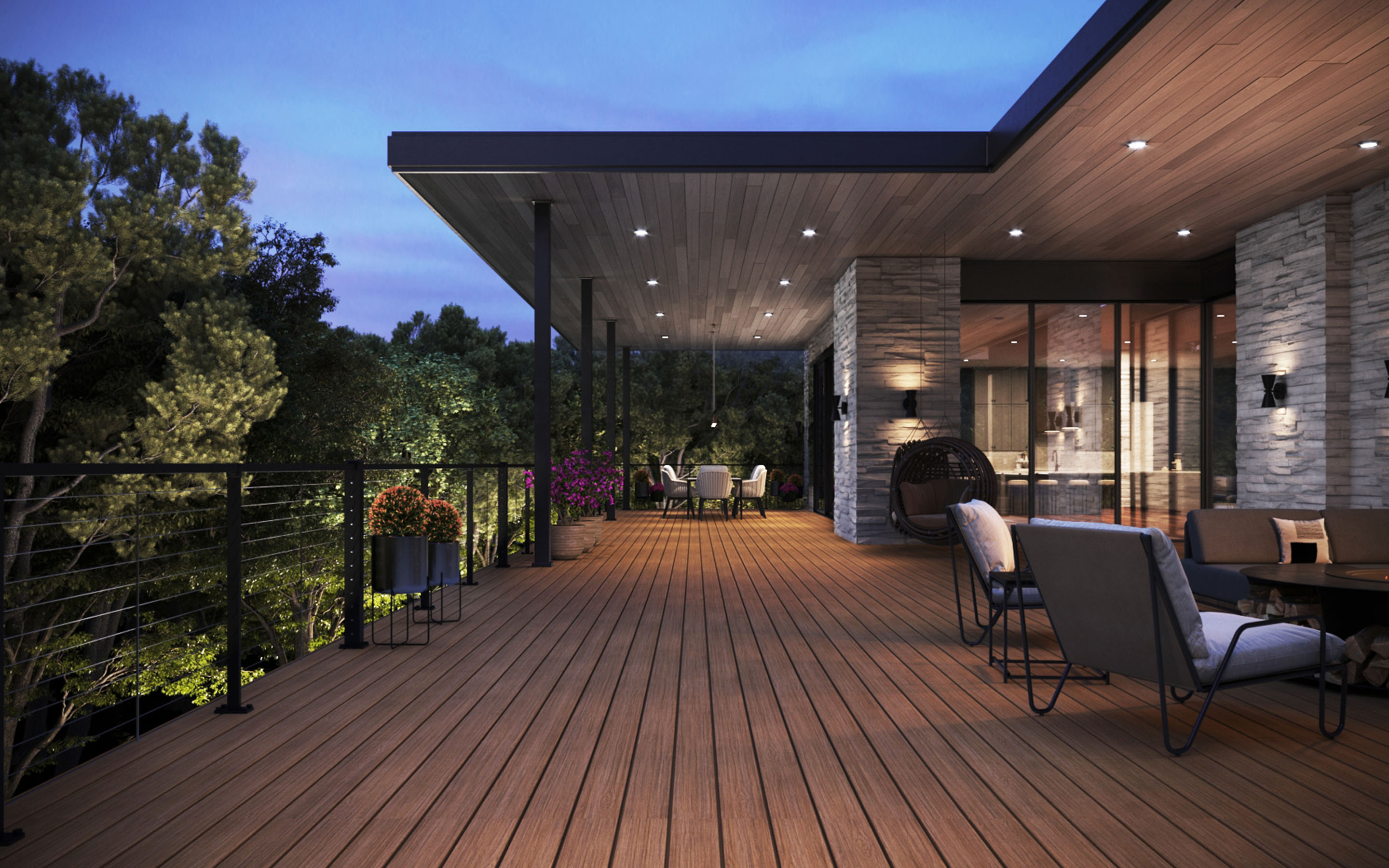 Contemporary Trex deck with overhang, integrated lighting, and forest view — modern outdoor space inspiration from Deck One.